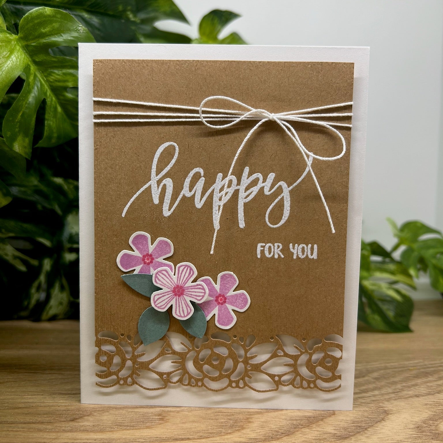 Handmade card with 'Happy for You' text, floral design, and lace details on a beige background.